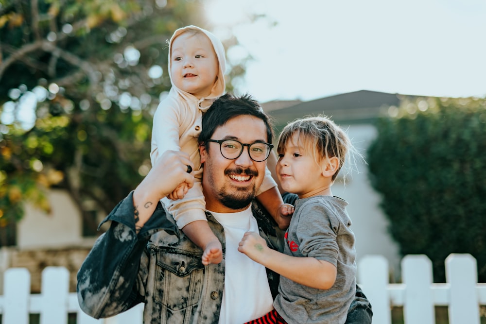 Happy family with keys to their new home